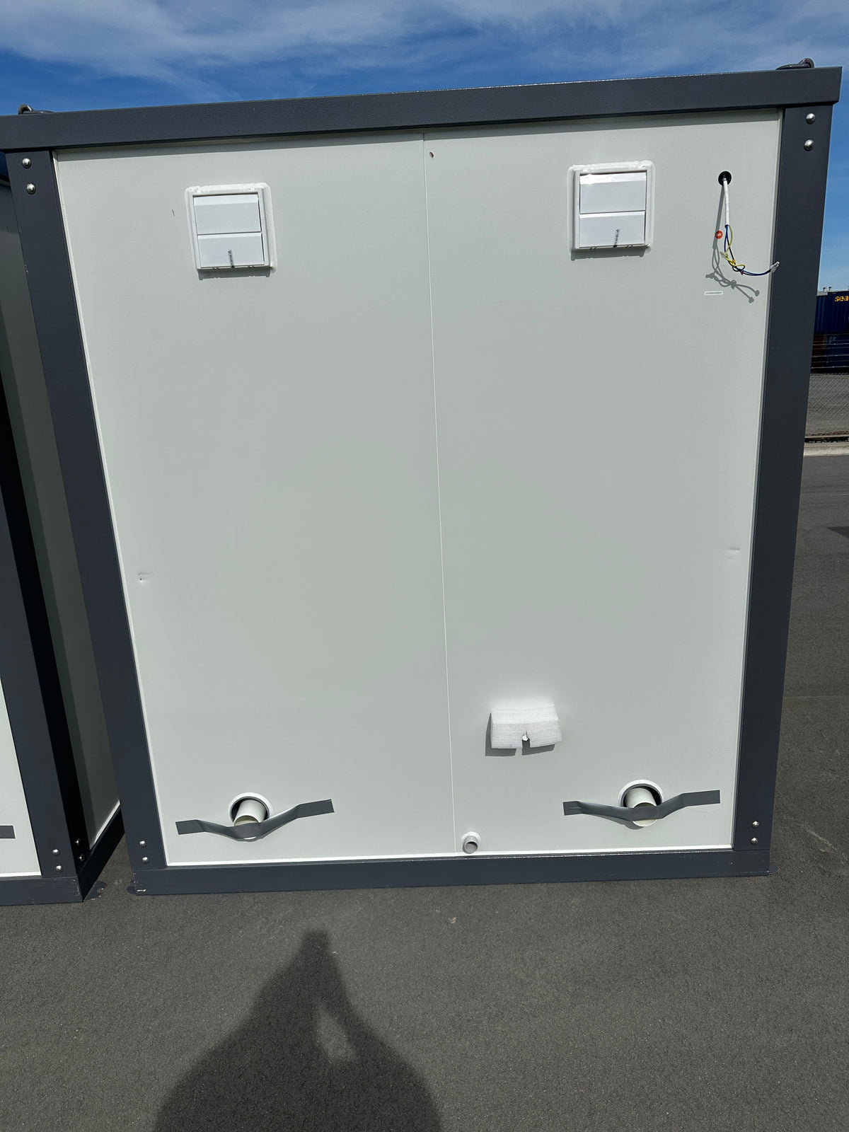 Mobile Double Toilets — rear exterior and service openings